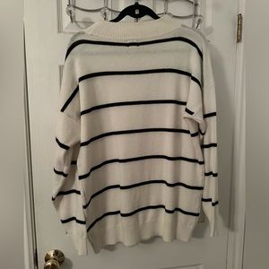 White with black striped sweater